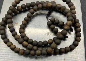 黑棋沉水树心油0.6mm*108珠重14.35克