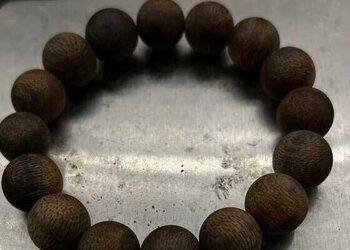 金丝糖结奇楠软油九分沉手串